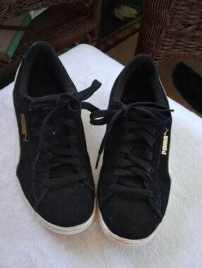 Puma Black Suede Sneakers with Gold Logo Accent